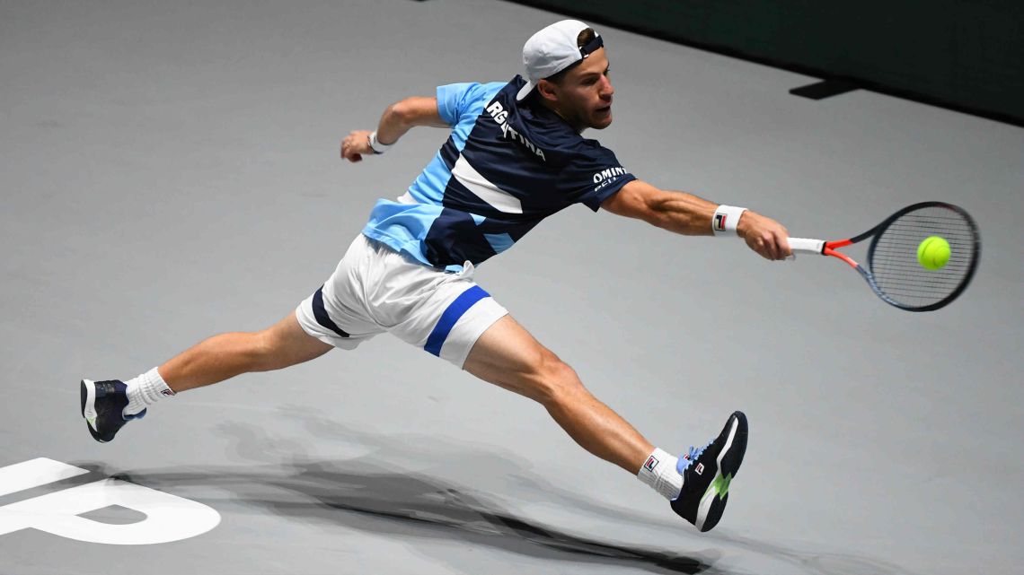 Argentina's Diego Schwartzman returns the ball to Germany's Jan-Lennard Struff during the singles tennis match between Argentina and Germany at the Davis Cup Madrid Finals 2019 in Madrid on November 20, 2019.  
