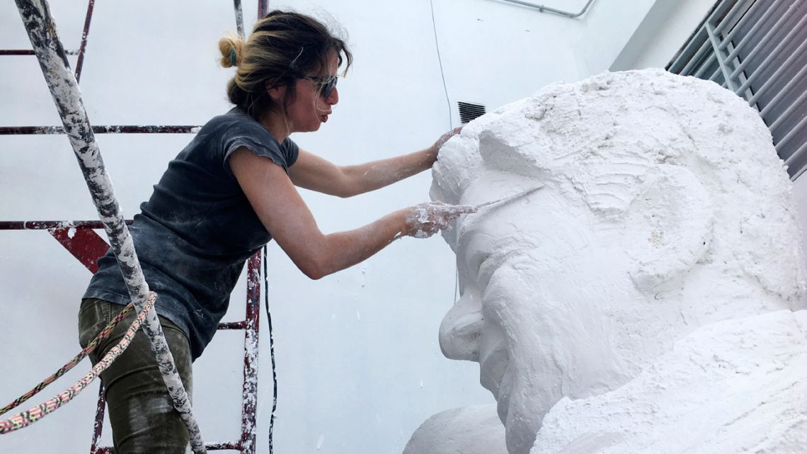 Artist Mercedes Savall works on a statue that depicts River Plate coach Marcelo Gallardo, in Buenos Aires, Argentina.