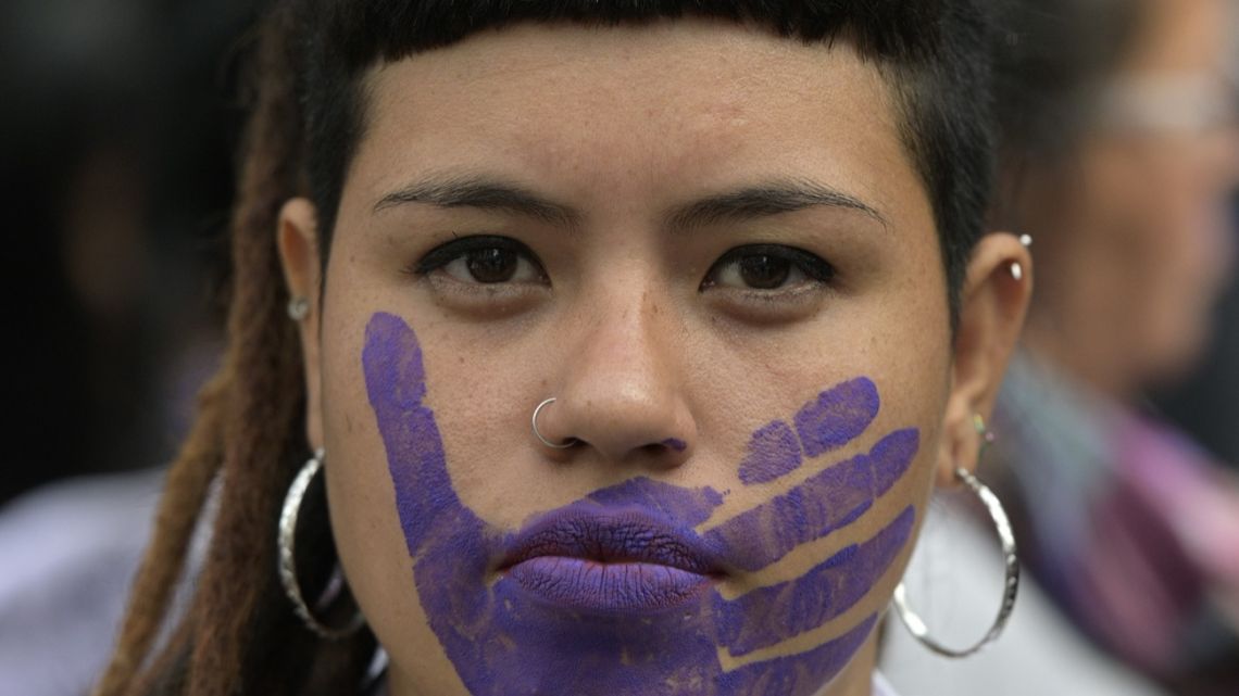 A woman takes part in a protest on the International Day for the Elimination of Violence against Women in Buenos Aires