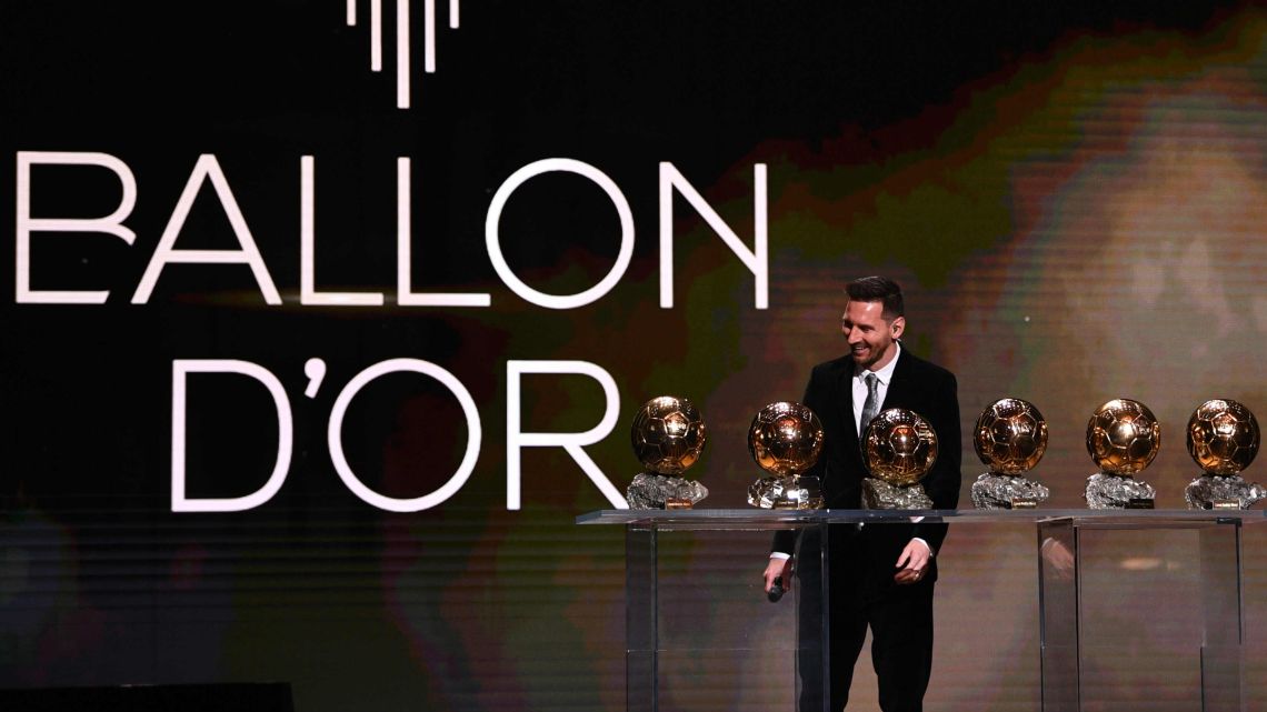 Barcelona's Argentinian forward Lionel Messi reacts after winning the Ballon d'Or France Football 2019 trophy at the Chatelet Theatre in Paris on December 2, 2019. Lionel Messi won a record-breaking sixth Ballon d'Or on Monday after another sublime year for the Argentinian, whose familiar brilliance remained undimmed even through difficult times for club and country.