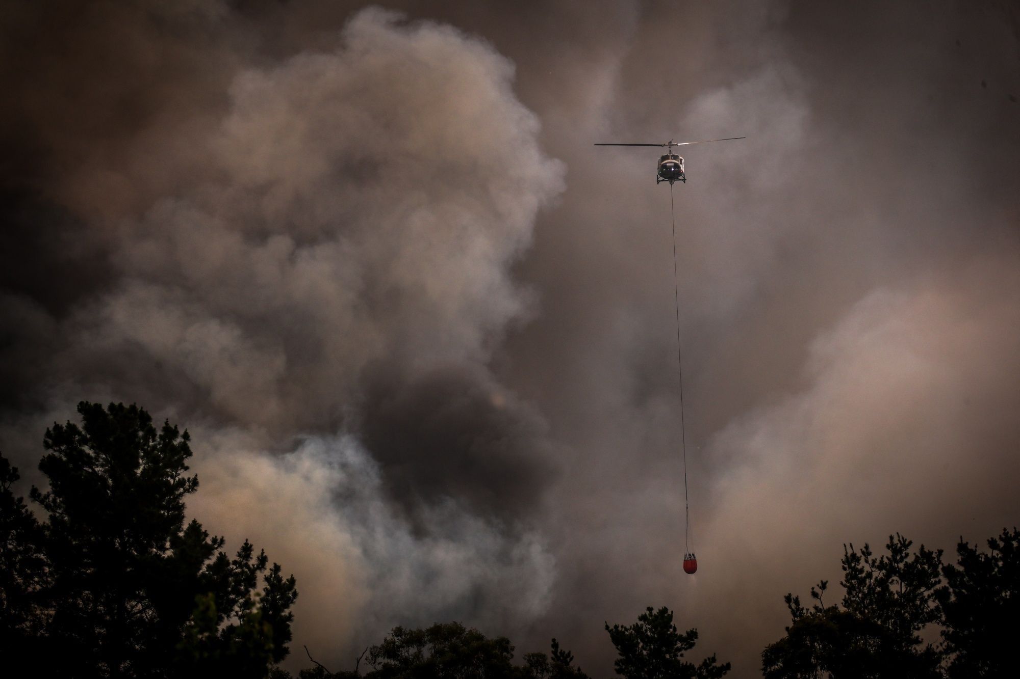 Firefighters Continue To Battle Bushfires As Catastrophic Fire Danger Warning Is Issued In NSW