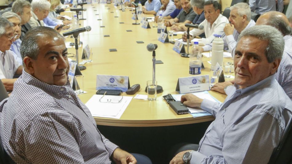 Los secretarios generales de la CGT, Carlos Acuña y Héctor Daer.