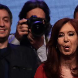 Máximo Kirchner (background, left) and Cristina Fernández de Kirchner.