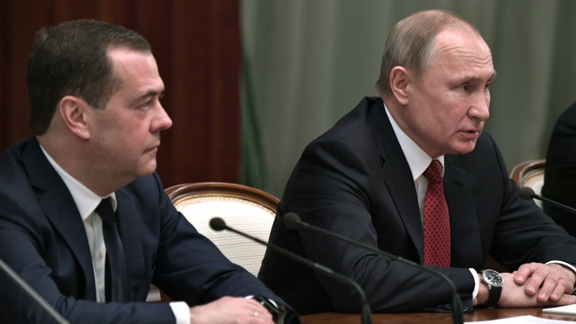 Russian President Vladimir Putin and Prime Minister Dmitry Medvedev meet with members of the government in Moscow on January 15, 2020.
