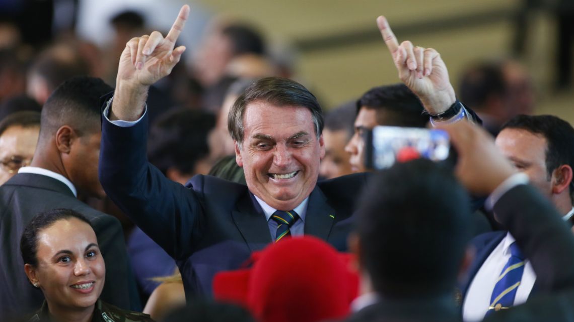 Brazilian President Jair Bolsonaro gestures during the changeover command ceremony of the Operacao Acolhida in Brazil, on January 15, 2020