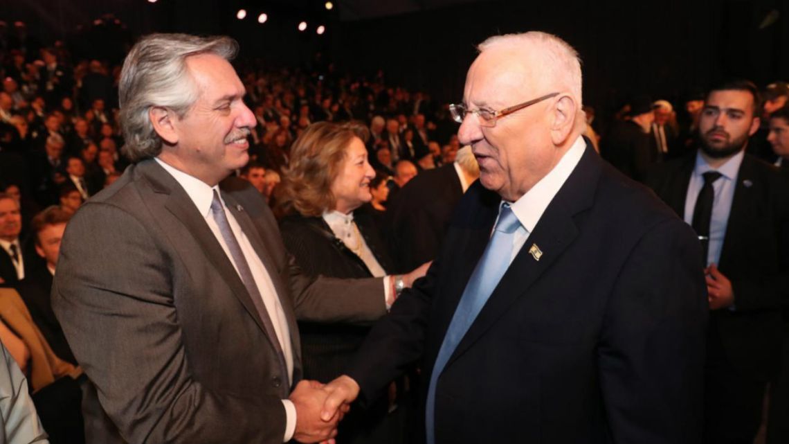 Argentine President Alberto Fernández greets Israeli President Reuven Rivlin