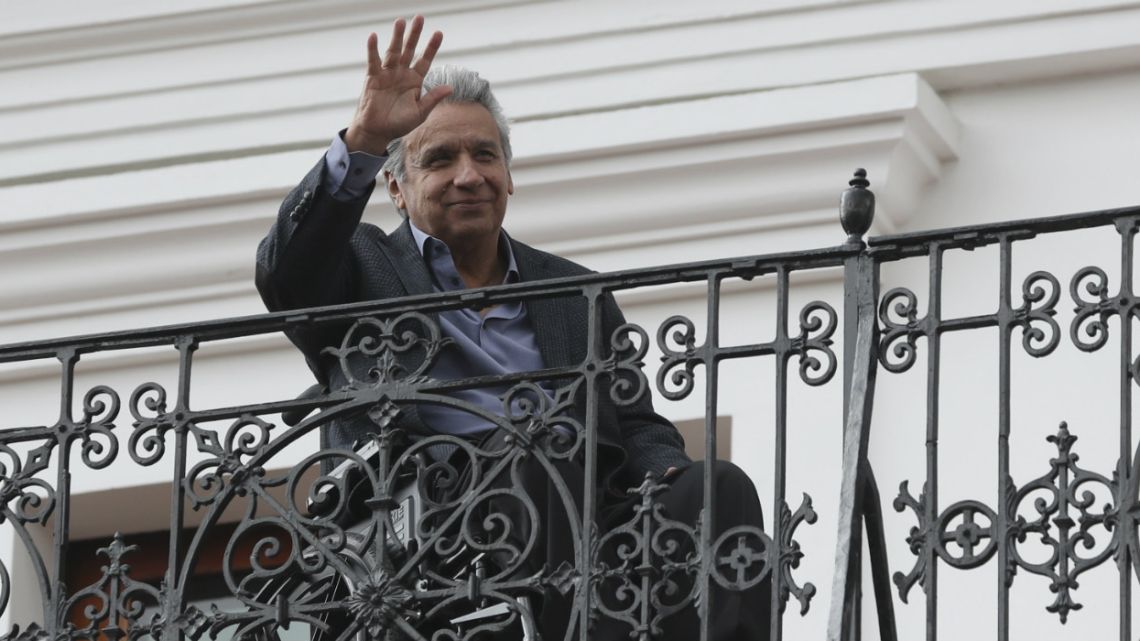 Ecuador's President Lenin Moreno waves to supporters gathered at Independence square, from the government palace's balcony in Quito, Ecuador.