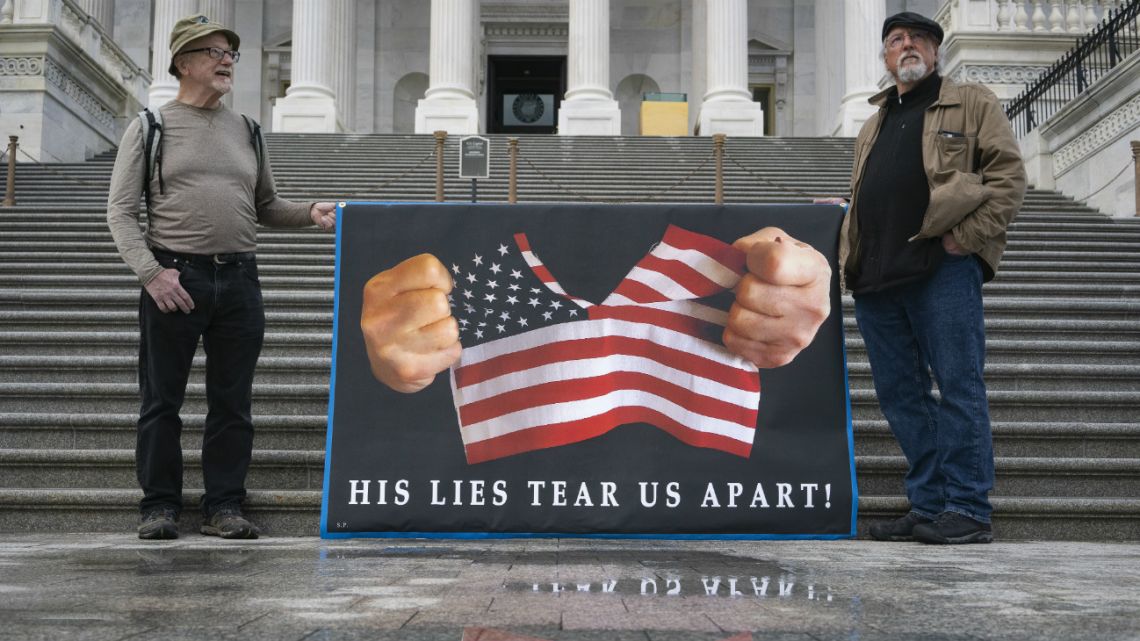 Demonstrators protest outside the U.S. Capitol on February 4, 2020 in Washington, DC. The Senate voted to block witnesses from appearing in the impeachment trial