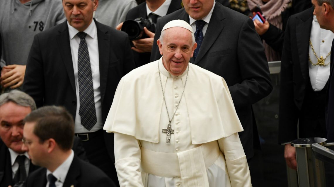 Pope Francis smiles as he arrives for his weekly general audience on February 5, 2020 at Paul VI hall in the Vatican.