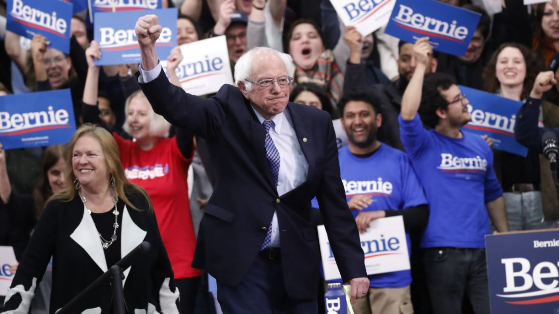 Bernie Sanders greets supporters after willing the New Hampshire democratic primary.