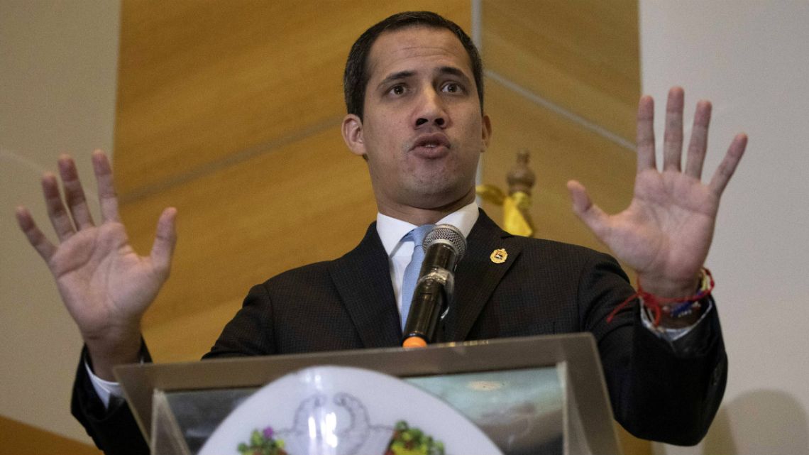 Self-proclaimed interim president of Venezuela and opposition leader Juan Guaido speaks during a press conference in Caracas, Venezuela.