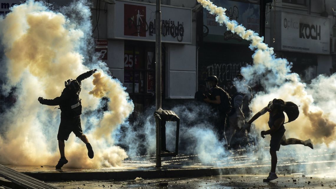 Demonstrators clash with the police during a protest against Chilean President Sebastian Pinera's government in Vina del Mar.