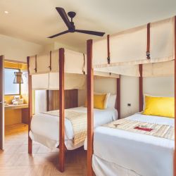 La confortable habitación de Miches mantiene la elegancia y el estilo Club Med.