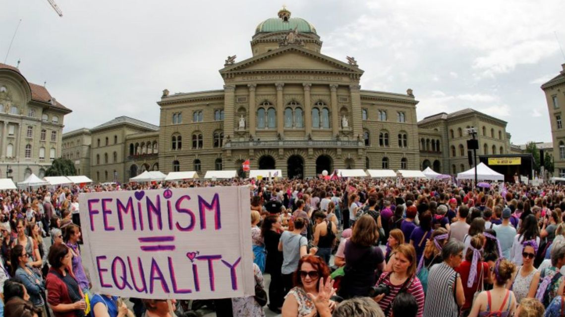 Women protest in front of the Swiss Parliament during a nationwide women’s strike for gender equality.