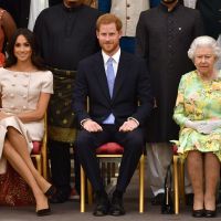 Meghan Markle y Harry, junto a Isabel
