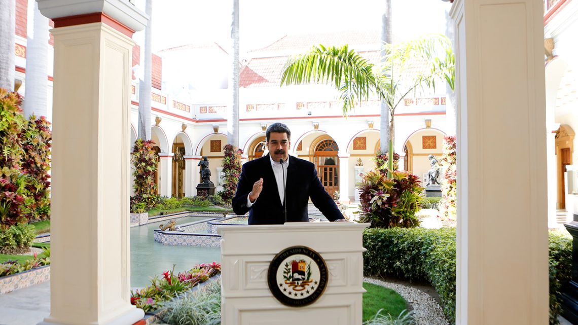 Handout picture released by Miraflores Presidential Palace showing Venezuela's President Nicolás Maduro making a televised announcement at the Miraflores Presidential Palace, in Caracas.