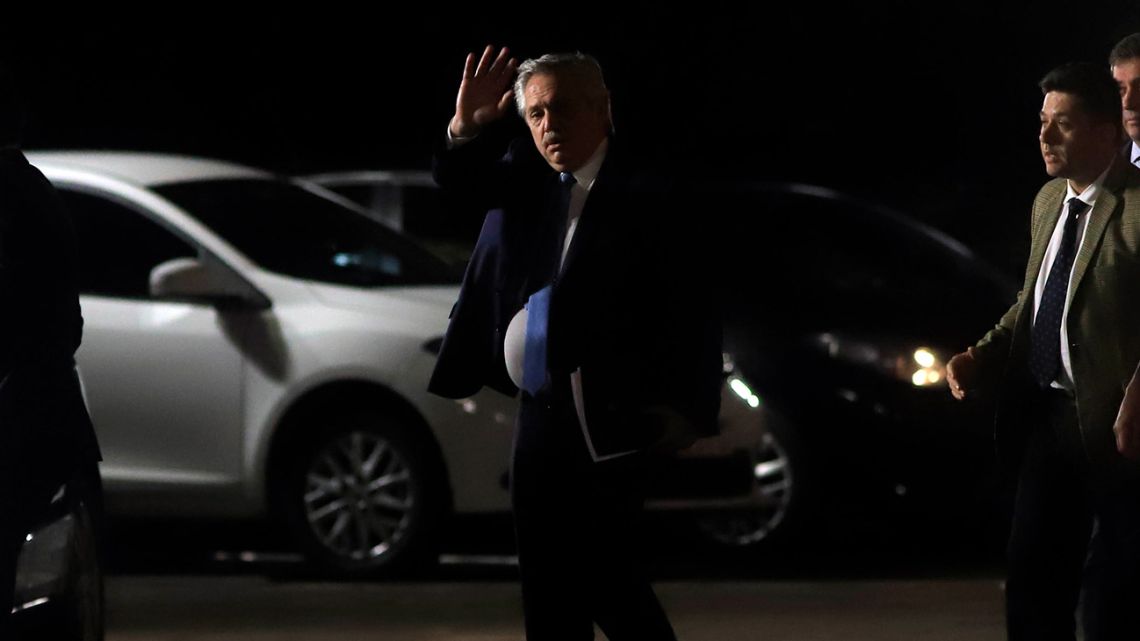 President Alberto Fernández leaves the Casa Rosada after a late-night meeting with opposition lawmakers.