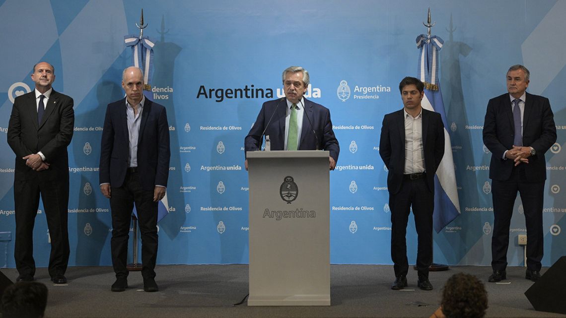 President Alberto Fernández – flanked by Buenos Aires City Mayor Horacio Rodríguez Larreta (2-L), Santa Fe Province Governor Omar Perotti (L), Buenos Aires Province Governor Axel Kicillof (2-R), and Jujuy Province Governor Gerardo Morales – announces measures during the outbreak of the new Coronavirus, COVID-19, at the Olivos presidential residence on March 19, 2020. 