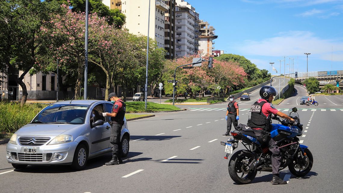 A driver is stopped by police in Buenos Aires, during the mandatory quarantine period during the coronavirus pandemic.