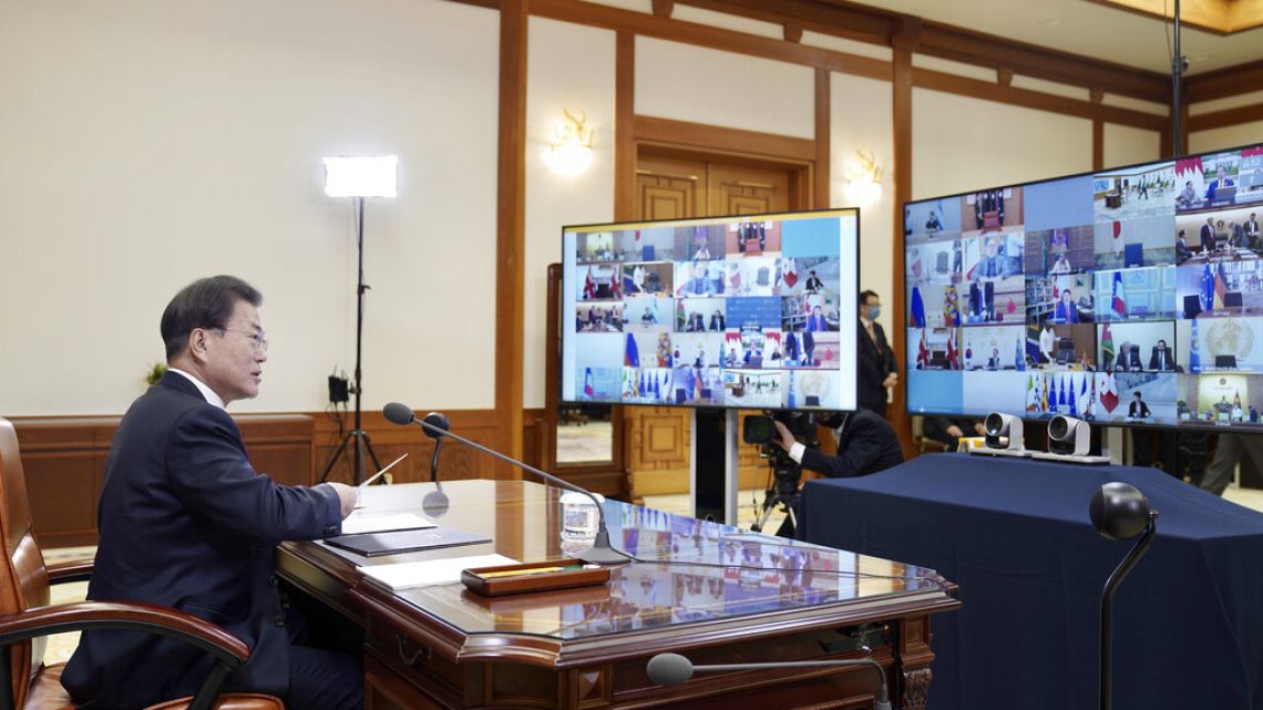 South Korean President Moon Jae-in attends G-20 virtual summit to discuss the coronavirus disease outbreak at the presidential Blue House in Seoul, South Korea, Thursday, March 26, 2020. 