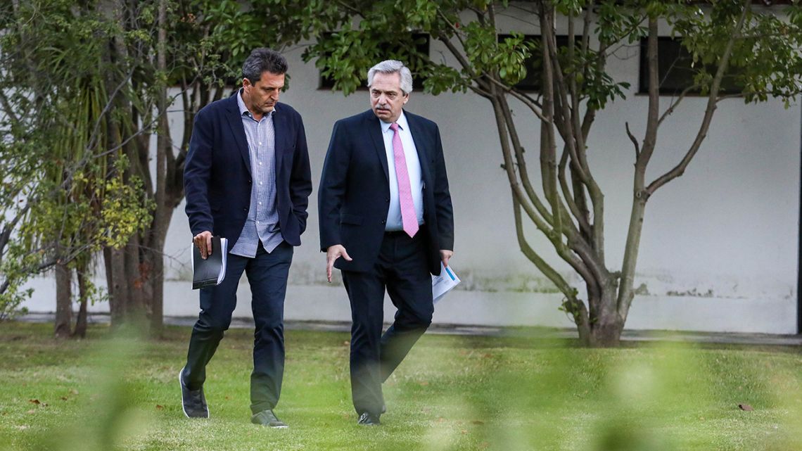 President Alberto Fernández takes a stroll with Lower House Speaker Sergio Massa on the grounds of the Olivos presidential residence.