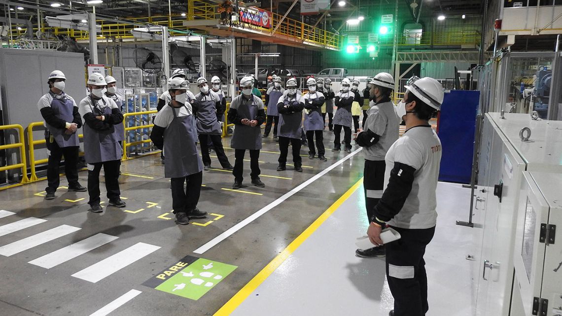 Workers return to their jobs at a Toyota factory in Buenos Aires Province, after the lockdown for the coronavirus pandemic.