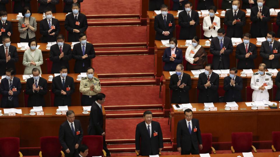 El presidente chino, Xi Jinping, y el primer ministro, Li Keqiang, al abrir las sesiones.