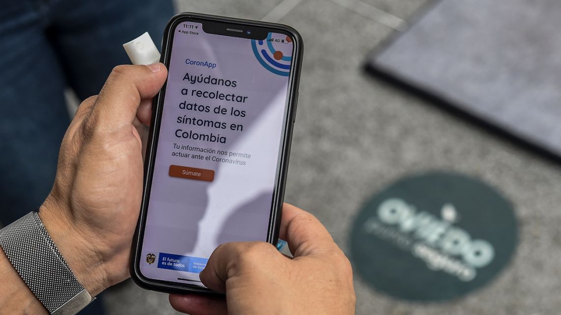 A man in Colombia uses the Coronapp application in Medellín. The activation of this App is a mandatory requirement to enter the three shopping malls allowed to reopen on May 25 in Medellín, as part of a tryout pilot programme that hopes to activate economic activities after the lockdown.