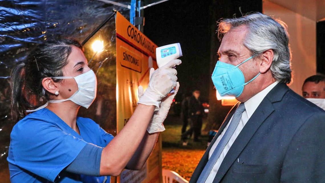 Measuring the temperature of Alberto Fernandez before entering to Misiones House of Government in Posadas, Misiones.
