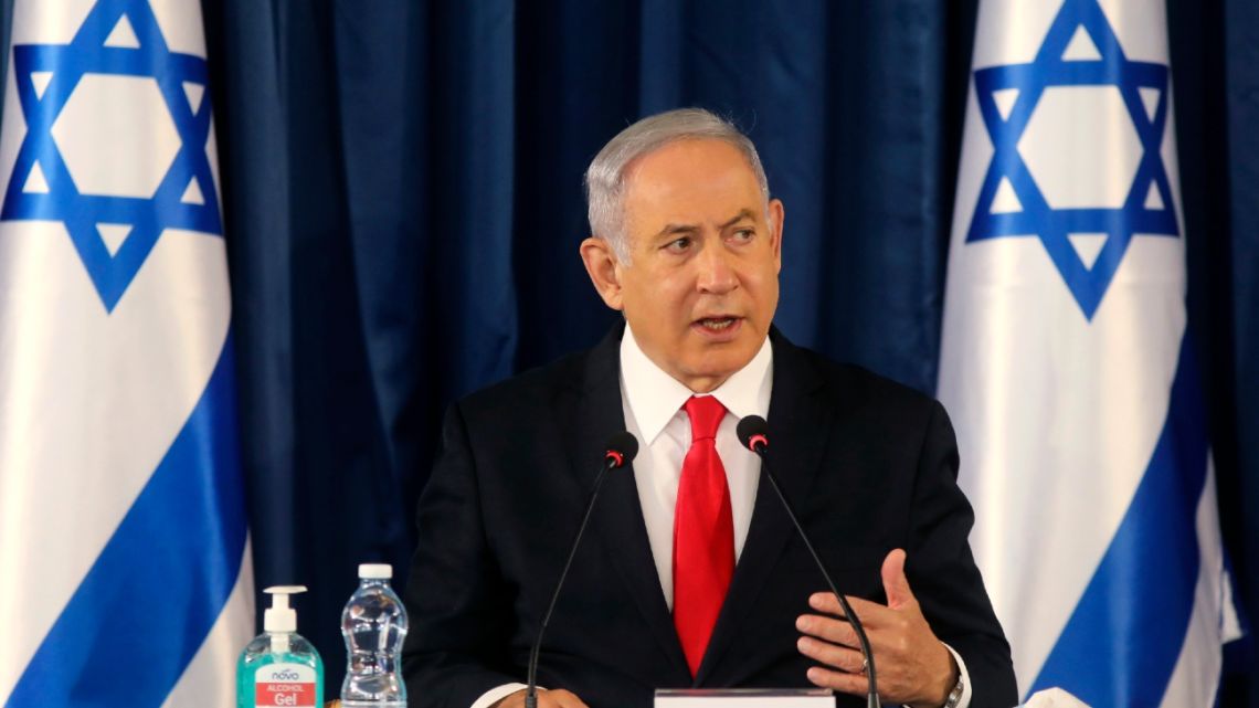 Israeli Prime Minister Benjamin Netanyahu chairs the weekly cabinet meeting in Jerusalem, Sunday, June 7, 2020.