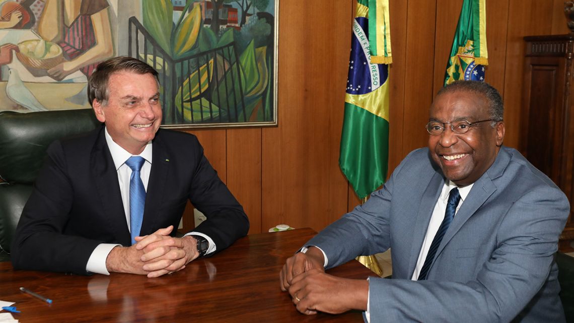 Handout picture released by Brazilian Presidency press office of President Jair Bolsonaro (left) and his Education Minister Carlos Alberto Decotelli.