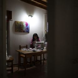 Tatiana Fronti works at her sewing machine during the government-ordered lockdown to curb the spread of the coronavirus. The 29-year-old textile designer separated from her decade-long partner days before the quarantine started, and had to cancel her trip to the United States to see her favourite singer, Lady Gaga. Instead of getting depressed, she redecorated her house, passed four subjects in an online business administration course, and focused on her underwear brand TIEF, and is seeing sales rise.
