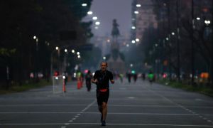 A man jogs in Buenos Aires, during the government-ordered lockdown to curb the spread of the novel coronavirus, Monday, July 20, 2020.