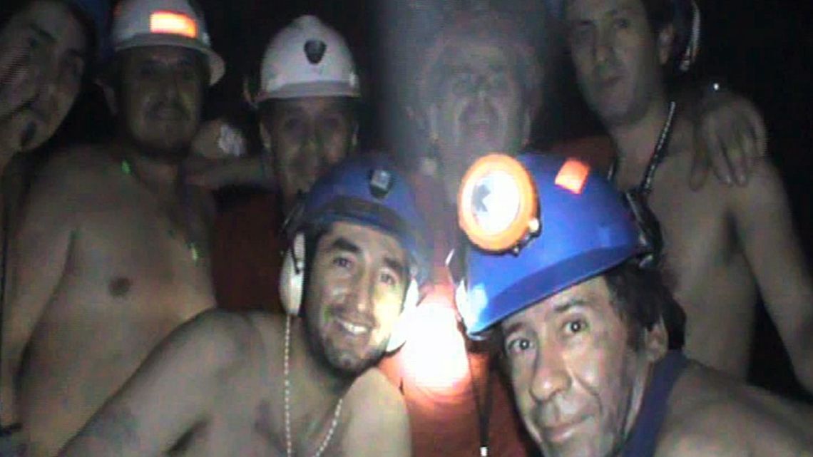 In this photo taken on September 17, 2010, trapped Chilean miners pose inside the San José Mine, near Copiapo, 800 km north of Santiago, Chile. Ten years after being trapped at the bottom of the San Jose mine in northern Chile, many of the 33 miners eel like heroes fallen into oblivion and abandonment. 