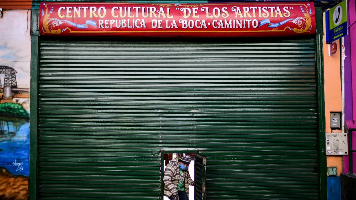 Colombian artist Edigson Agudelo is pictured leaving the closed Centro Cultural De Los Artistas in La Boca, Buenos Aires, amid the new coronavirus pandemic.