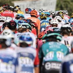 Los ciclistas corren durante la 19a etapa de la 107a edición de la carrera ciclista del Tour de Francia, 160 km entre Bourg-en-Bresse y Champagnole. | Foto:KENZO TRIBOUILLARD / AFP