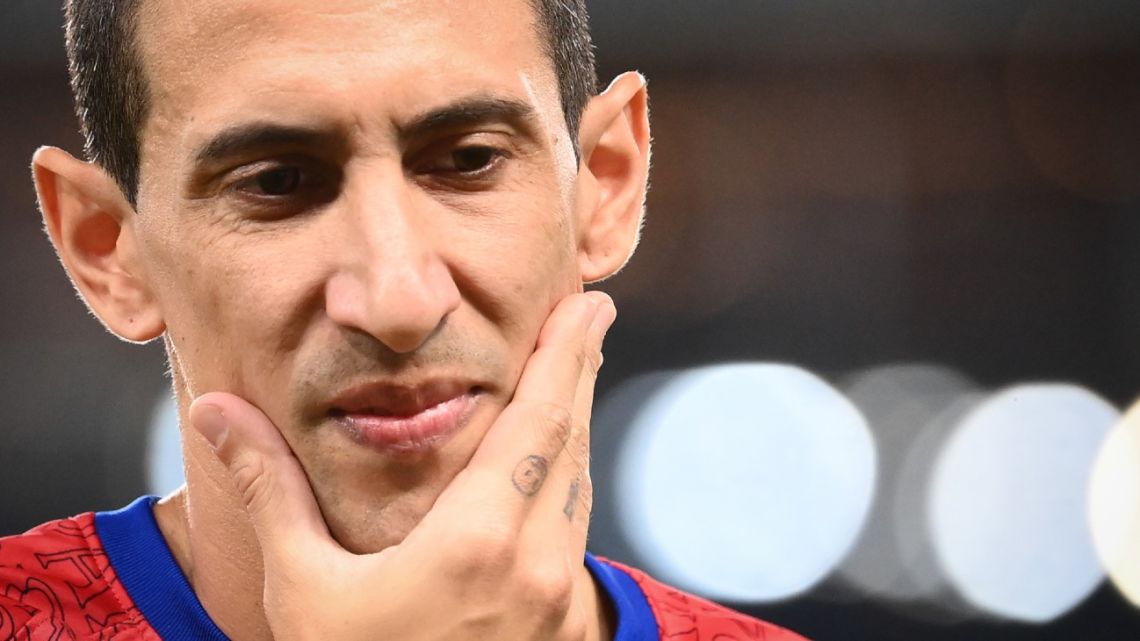 In this file photo taken on September 16, 2020, Paris Saint-Germain's midfielder Ángel Di María warms up prior to the French L1 football match between Paris Saint-Germain (PSG) and Metz, at the Parc des Princes stadium in Paris. Di Maria is suspended for four matches for spitting on a Marseille player, the French Ligue announced on September 23, 2020. 