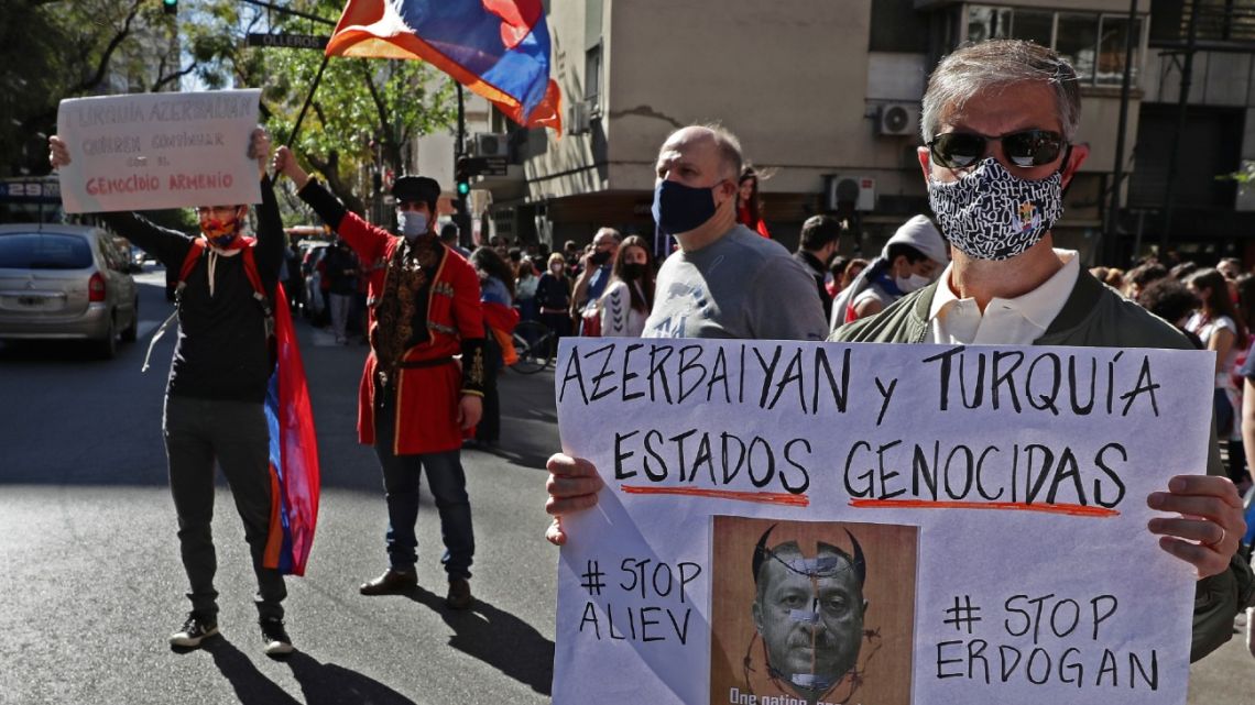 Members of the Armenian community march towards the Azerbaijan and Turkey Embassies in Buenos Aires, on October 10, 2020, during a protest in support of Armenia and Karabakh amid the territorial dispute with Azerbaijan over Nagorno Karabakh.
