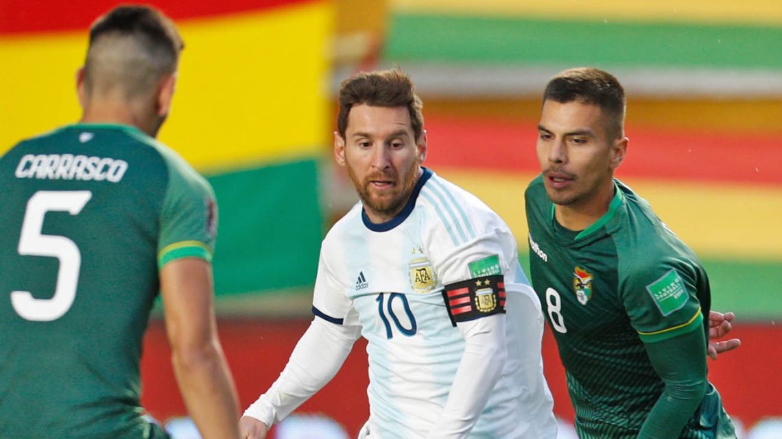 Lionel Messi takes on two Bolivia players during Argentina’s 2022 FIFA World Cup South American qualifiing match this week.