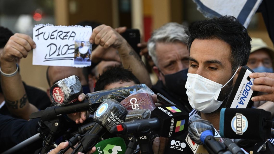 Leopoldo Luque, the personal physician of Diego Maradona, gives a medical report outside the Ipensa clinic where the Argentine legend has been admitted, in La Plata, Buenos Aires Province, on November 3, 2020. Argentine football great Diego Maradona was admitted to hospital Monday for medical checks, his personal doctor announced. 