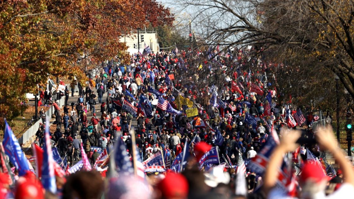 People participate in the “Million MAGA March” from Freedom Plaza to the Supreme Court, on November 14, 2020 in Washington DC. 