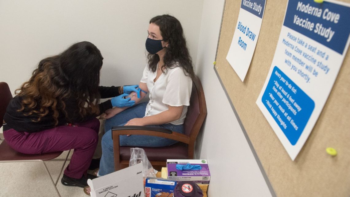 In this image courtesy of the Henry Ford Health System, a volunteer is tested before being given the Moderna mRNA-1273 Coronavirus Efficacy (COVE), in Detroit, Michigan. US biotech firm Moderna on November 16, 2020 announced its experimental vaccine against Covid-19 was 94.5 percent effective, marking a second major breakthrough in the vaccine hunt. 