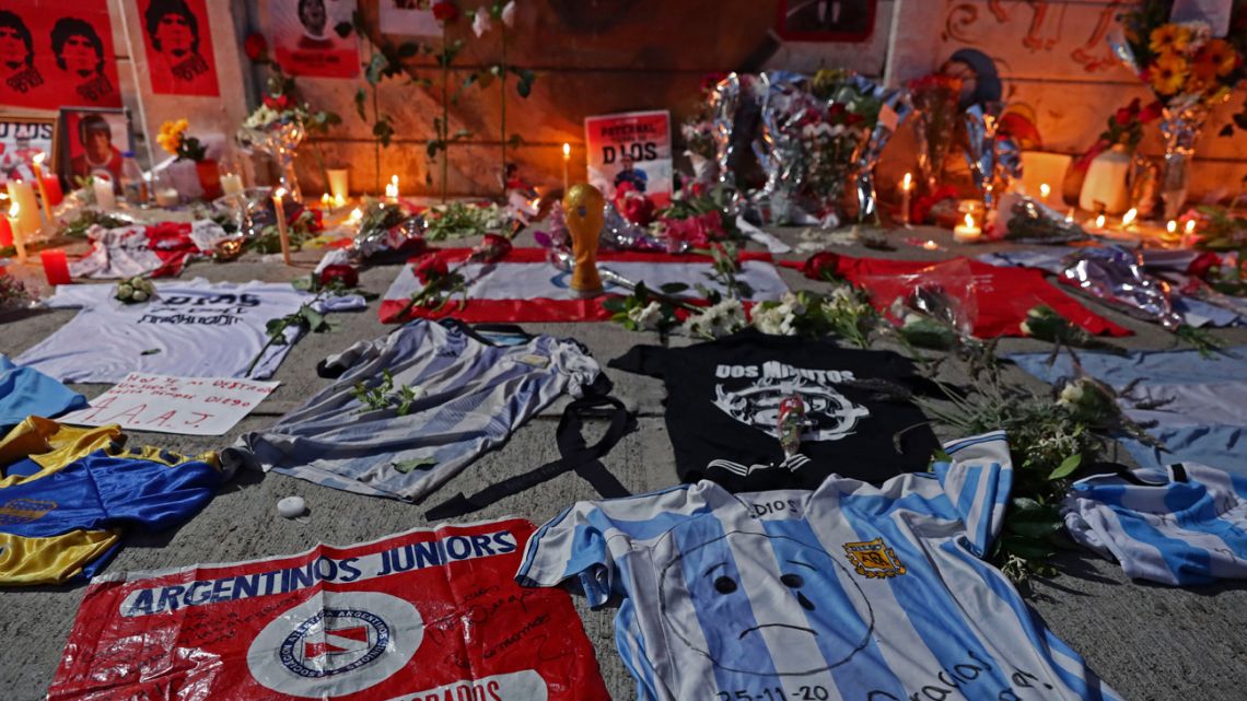 View of an improvised altar set up by fans of Argentinos Juniors, where Diego Maradona began his career, outside the club's Diego Armando Maradona Stadium in La Paternal.