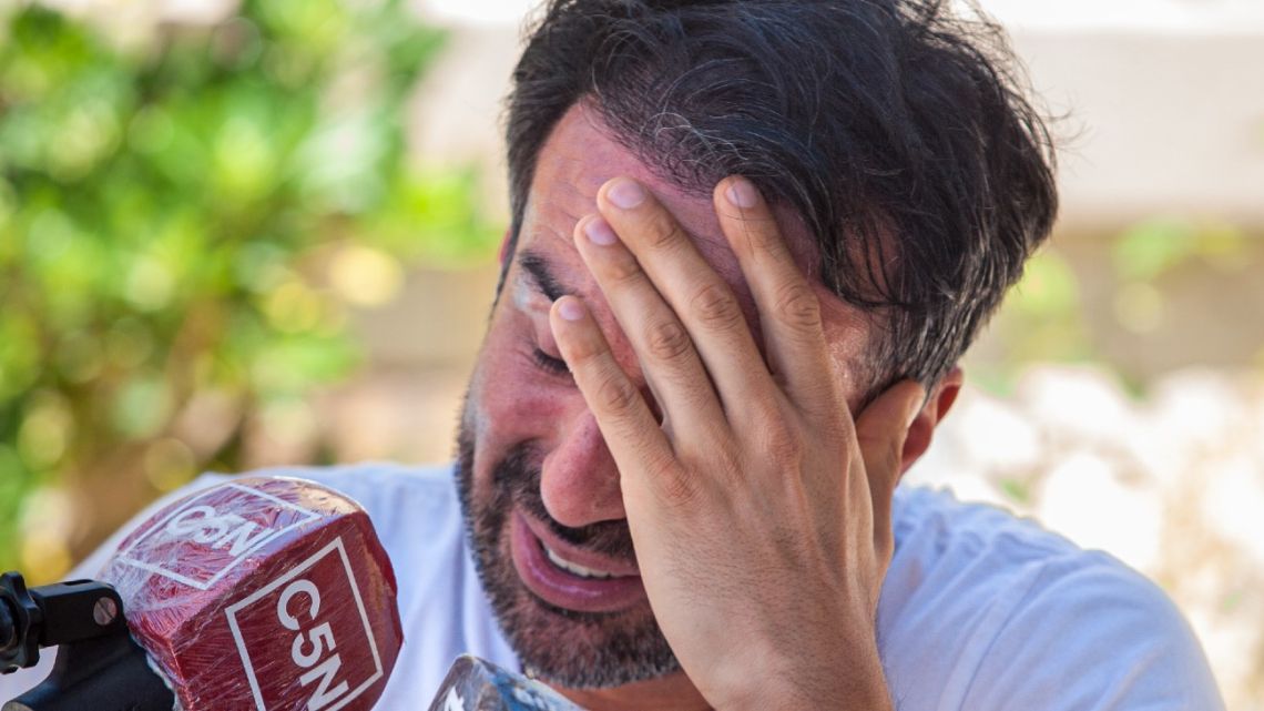 Leopoldo Luque, Diego Maradona's personal doctor, speaks with journalists outside his home in Adrogué.