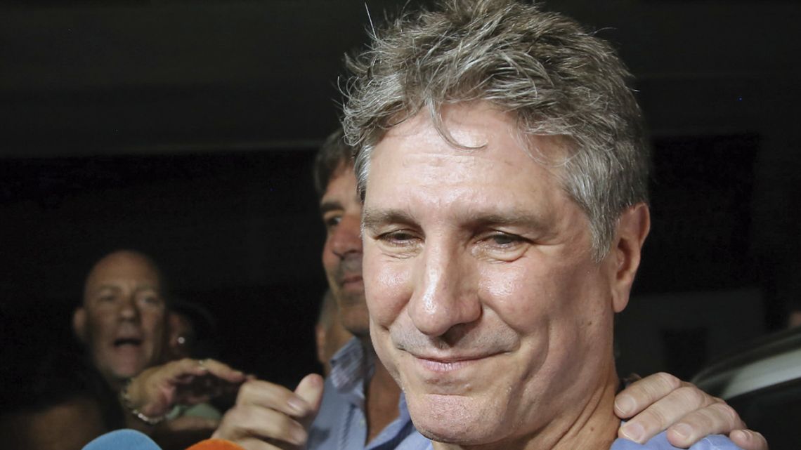 Former vice-president Amado Boudou talks to reporters in this file photograph.