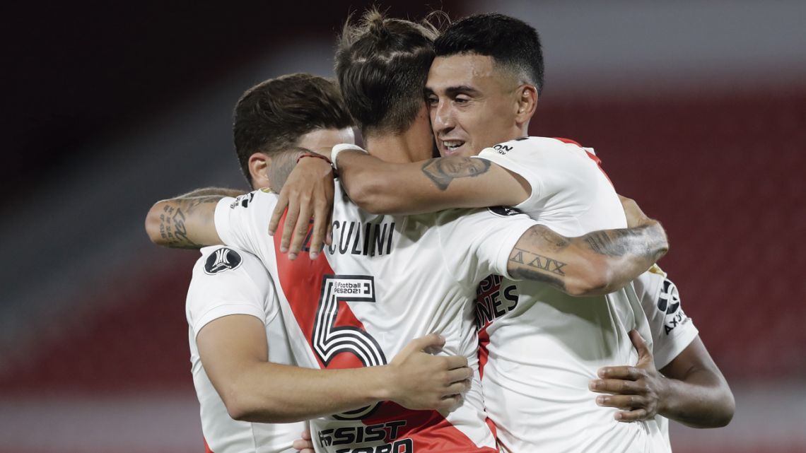 River Plate’s Bruno Zuculini (centre) celebrates with teammates after scoring against Uruguay’s Nacional in their Copa Libertadores quarter-final clash.