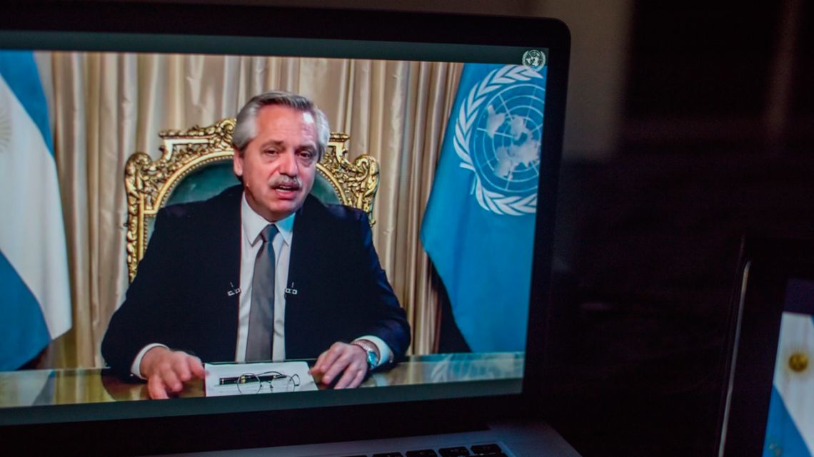 President Alberto Fernández, pictured on a laptop during a speech.