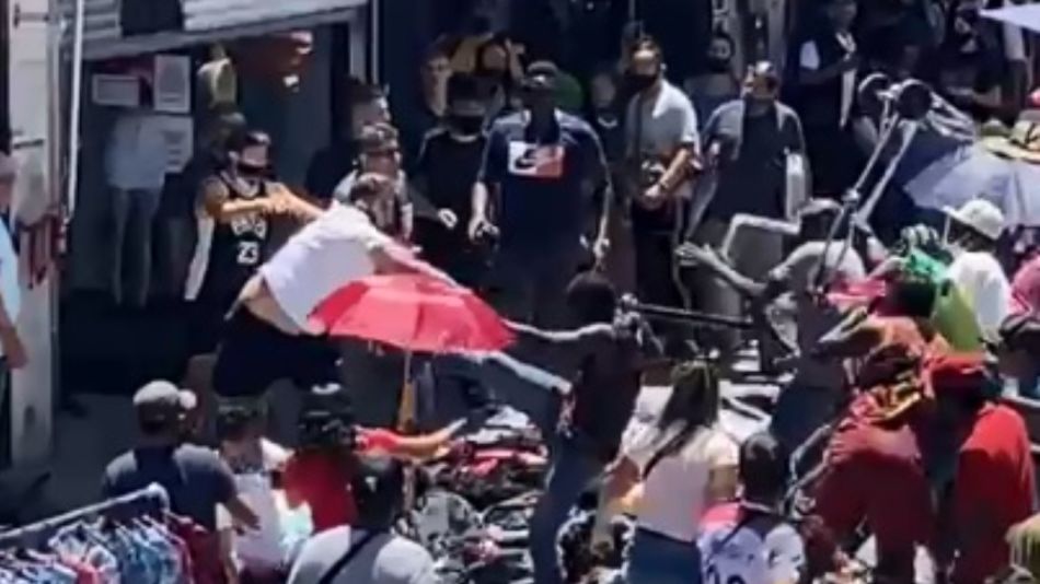 incidentes pelea manteros comerciantes flores g_20201222