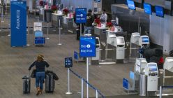 Travelers At SFO Airport Ahead Of Christmas Holiday