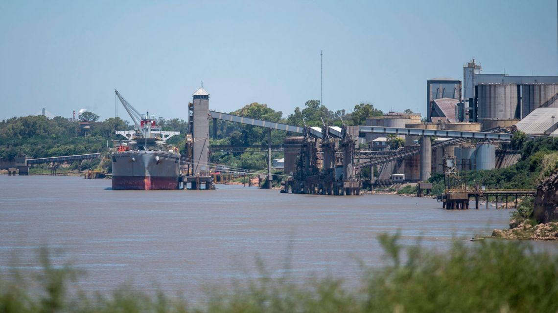 A cargo ship remains anchored on the Paraná River in San Lorenzo, just north of Rosario, in the province of Santa Fe, on December 22, 2020, as workers at agro-export ports hold a strike.